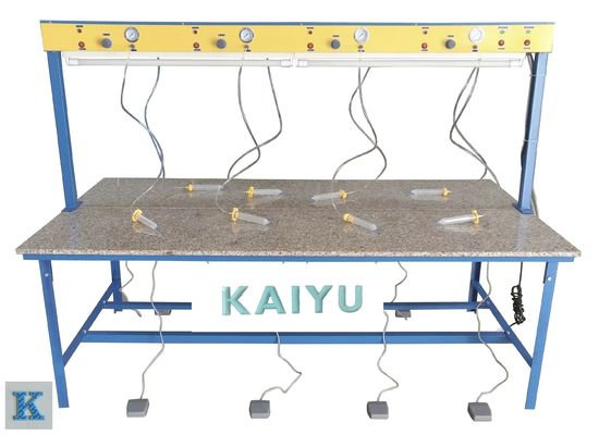 Un buen precio. Máquina de embozamiento industrial para la mesa de distribución de pegamento de silicona neumático en línea